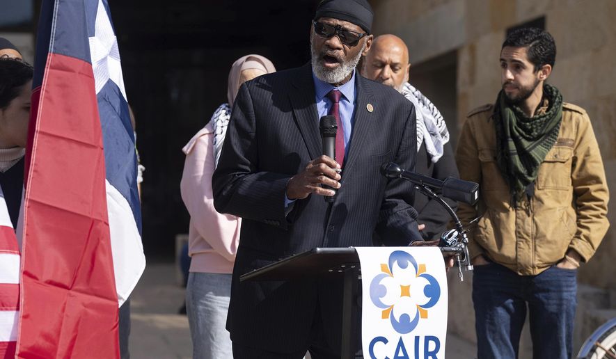 Mustafaa Caroll, interim executive director of the Council on American Islamic Relations (CAIR-Texas), speaks during a press conference outside City Hall, Tuesday, Feb. 6, 2024, in Austin, Texas. The stabbing of Zacharia Doar, a Palestinian-American, who advocates say was attacked near the University of Texas campus while riding in a car displaying support for Palestine merits the label of a hate crime, police announced Wednesday. (Mikala Compton /Austin American-Statesman via AP)