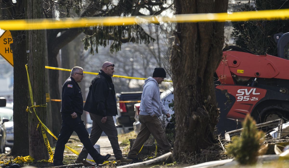 NextImg:Search resumes at charred home after shootout and fire left 2 officers hurt and 6 people missing