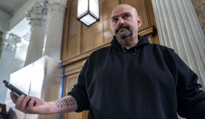 Sen. John Fetterman, D-Pa., arrives as the Senate holds a procedural vote on a package of wartime funding for Ukraine, Israel and other U.S. allies, at the Capitol in Washington, Friday, Feb. 9, 2024. (AP Photo/J. Scott Applewhite) **FILE**