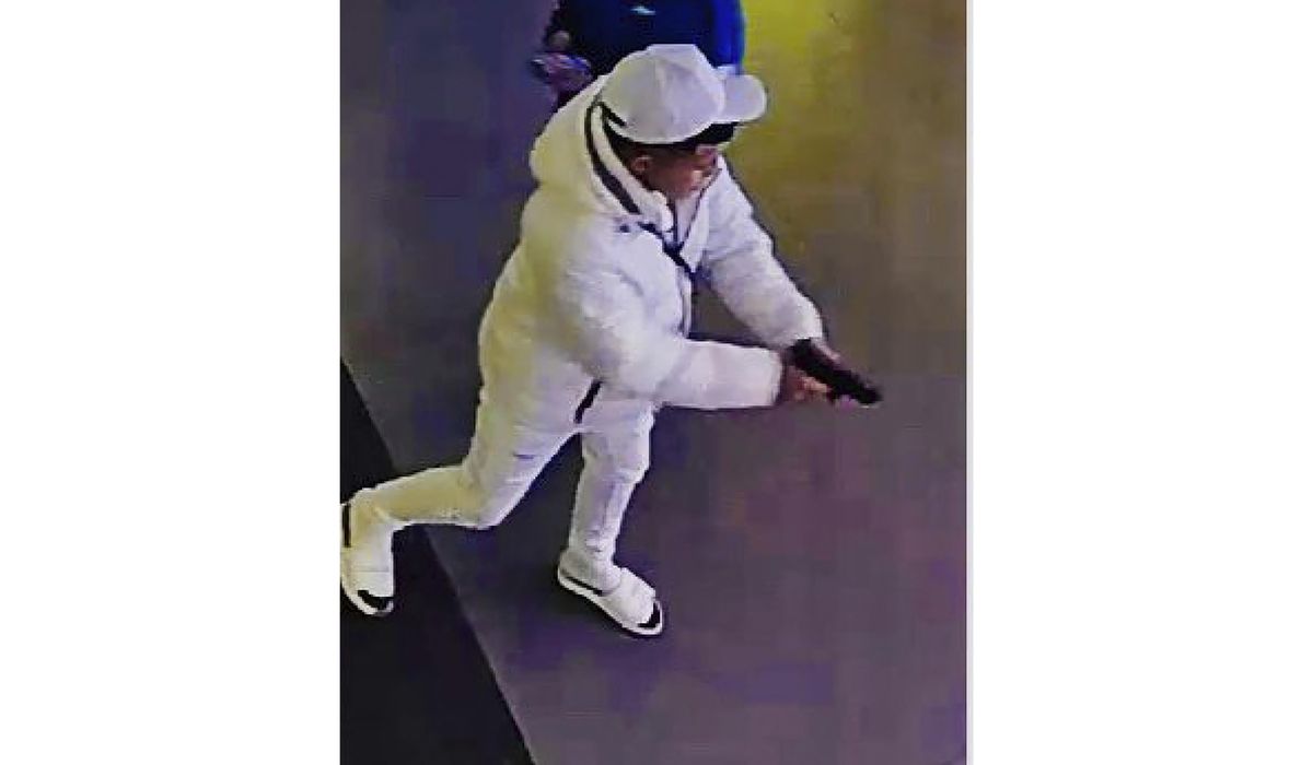 NextImg:Teen accused of shooting tourist in Times Square and firing at officer is arrested