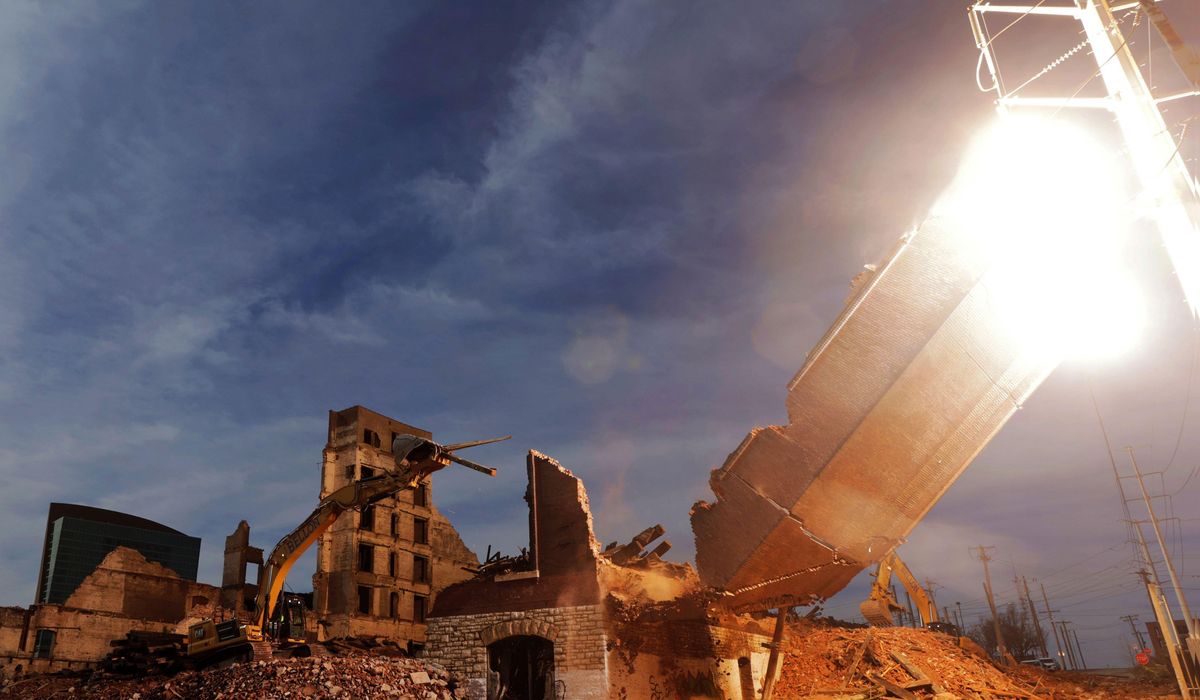 NextImg:St. Louis wrecking crew knocks wall into transmission tower during demolition; brief explosion