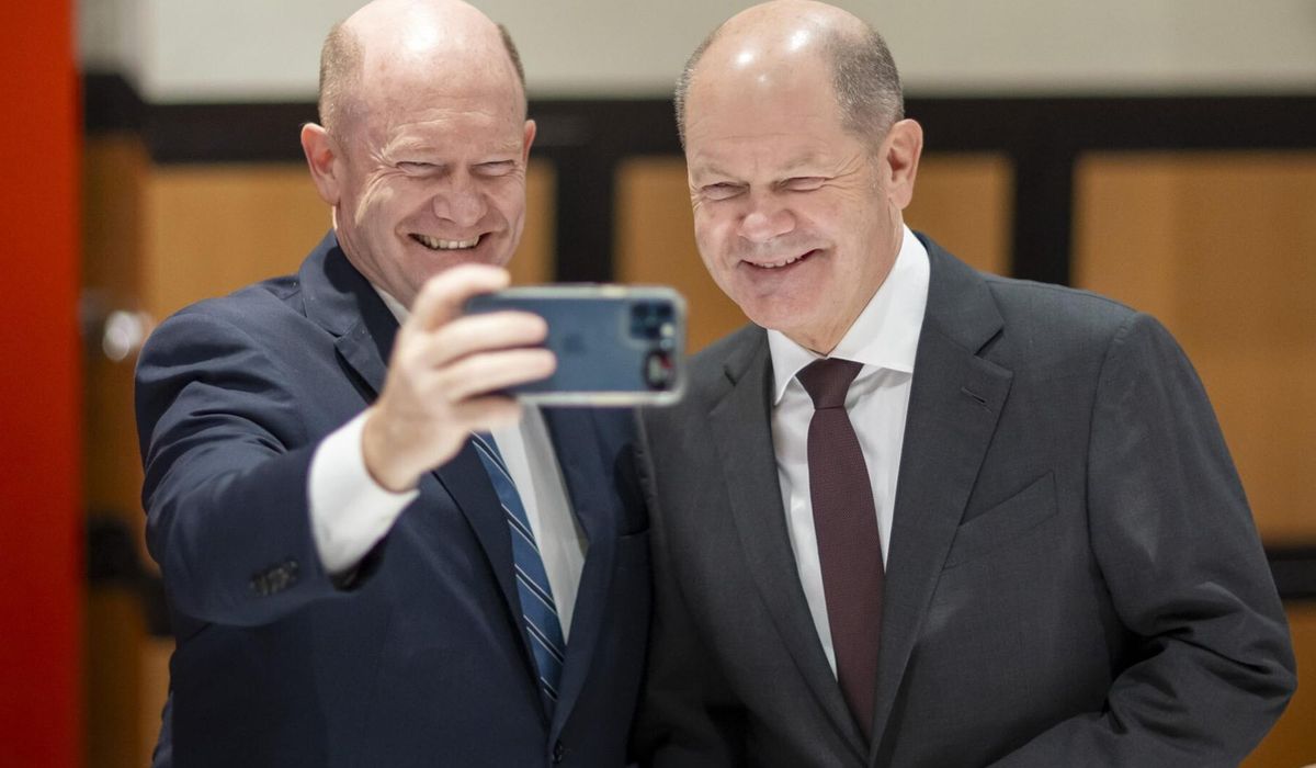 NextImg:US Sen. Coons and German Chancellor Scholz see double at Washington meeting