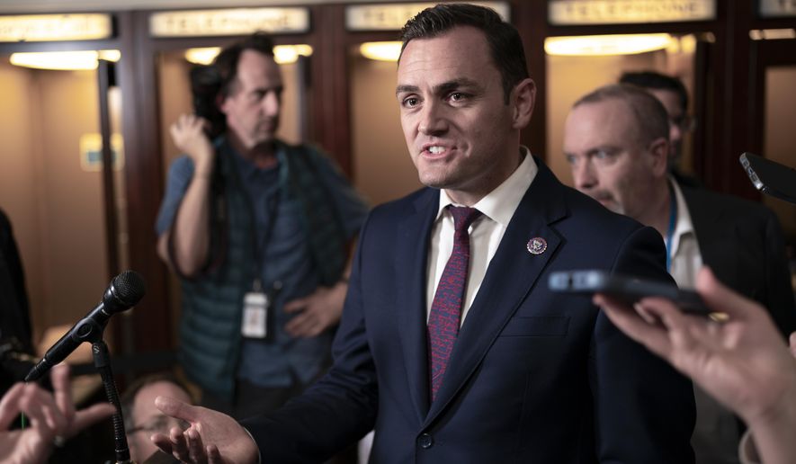 FILE - Rep. Mike Gallagher, R-Wis., speaks to reporters after Rep. Tom Emmer, R-Minn., the GOP whip, dropped out of the speaker race, at the Capitol in Washington, Tuesday, Oct. 24, 2023. Gallagher announced his retirement Saturday, Feb. 10, 2024, just days after he refused to vote with his fellow House Republicans to impeach Homeland Security Secretary Alejandro Mayorkas. (AP Photo/J. Scott Applewhite, File)