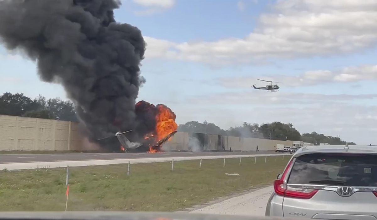NextImg:Investigators will try to find out why a private jet crashed onto a Florida interstate and killed 2