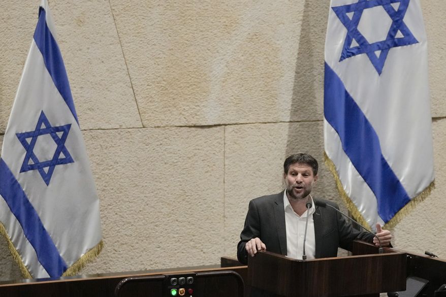 Bezalel Smotrich, Israeli Minister of Finance, addresses the parliament in Jerusalem, March 27, 2023. Israel's finance minister has slammed a decision by the financial ratings agency Moody’s to downgrade Israel’s credit rating. Bezalel Smotrich says the decision “did not include serious economic claims.” In its announcement Friday, Feb. 9, 2024, Moody's warned that the ongoing war in Gaza and a possible war in the north with Hezbollah could adversely affect Israel’s economy. (AP Photo/Maya Alerruzzo, file)