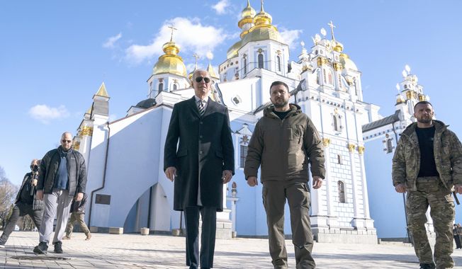 U.S. President Joe Biden walks with Ukrainian President Volodymyr Zelenskyy in Kyiv, Ukraine, Monday, Feb. 20, 2023. As chances rise of a Biden-Donald Trump rematch in the U.S. presidential election race, America’s allies are bracing for a bumpy ride, with concerns rising that the U.S. could grow less dependable regardless of who wins. (AP Photo/ Evan Vucci, File)