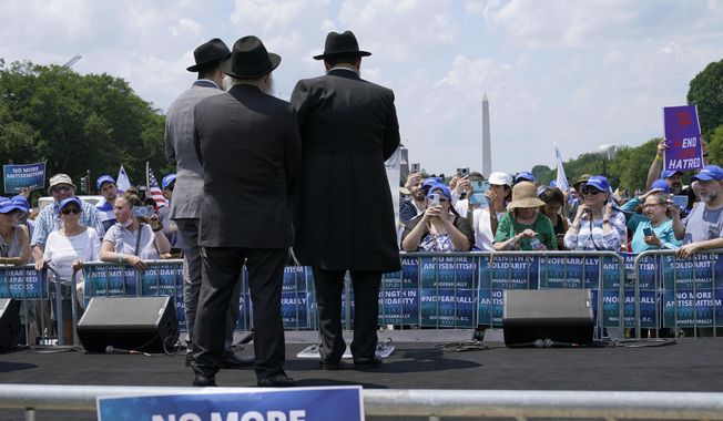 People attend the &quot;NO FEAR: Rally in Solidarity with the Jewish People&quot; event in Washington, Sunday, July 11, 2021, co-sponsored by the Alliance for Israel, Anti-Defamation League, American Jewish Committee, B&#x27;nai B&#x27;rith International and other organizations. The American Jewish Committee released a survey on Tuesday, Feb. 13, 2024, that found nearly two-thirds of American Jews feel less secure in the U.S. than they did a year ago. The group conducted the survey on antisemitism last fall just as the Israel-Hamas war began. (AP Photo/Susan Walsh, File)