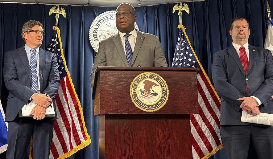 Boston Police Chief Michael Cox speaks, Wednesday, Feb. 14, 2024, during a news conference at the federal courthouse in Boston, about charges brought against 40 gang members in Boston that include drug trafficking, COVID fraud and racketeering. (AP Photo/Michael Casey) **FILE**