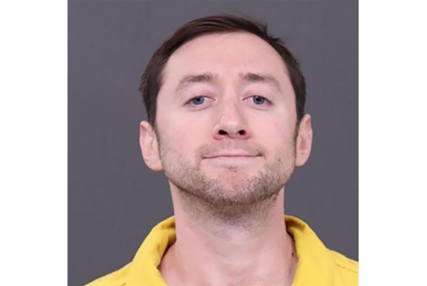 This photo provided by Bucks County District Attorney's Office shows Justin Mohn. Authorities have added more charges, including terrorism, against Mohn, a Pennsylvania man charged with fatally shooting his father, decapitating him and posting a video online in which he held up the severed head. (Bucks County District Attorney's Office via AP, File)