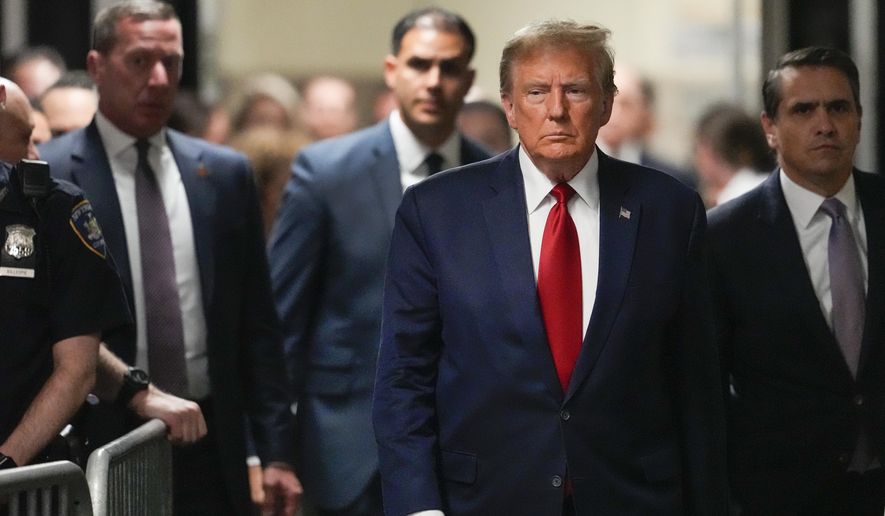 Former President Donald Trump arrives at Manhattan criminal court, Thursday, Feb. 15, 2024, in New York. Trump is expected to be back in a New York court Thursday for a hearing that could decide whether the former president&#x27;s first criminal trial begins in just 39 days. (AP Photo/Mary Altaffer)
