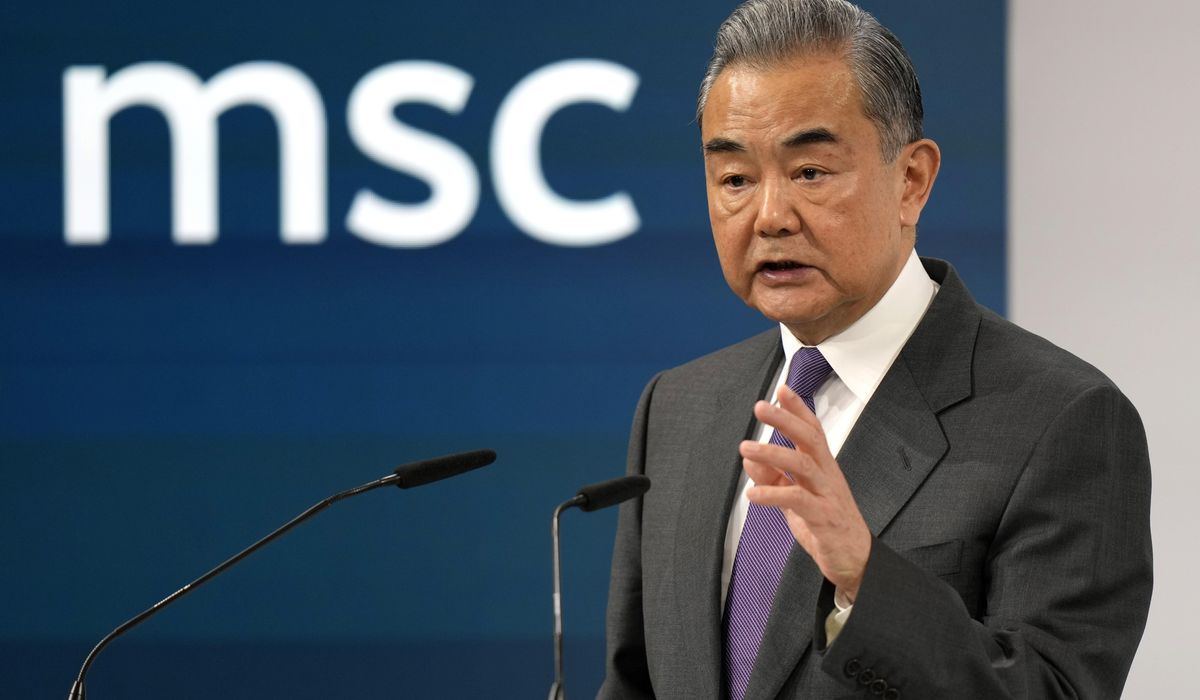 NextImg:Chinese foreign minister says trying to cut his country out of trade would be a historic mistake