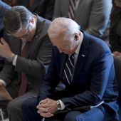 President Joe Biden, with from left, House Minority Leader Hakeem Jeffries, D-N.Y., and House Speaker Mike Johnson of La., pray and listen during the National Prayer Breakfast, Thursday, Feb. 1, 2024, at the Capitol in Washington. Johnson has spoken in the past of his belief America was founded as a Christian nation. Biden, while citing his own Catholic faith, has spoken of values shared by people of “any other faith, or no faith at all.” (AP Photo/J. Scott Applewhite, File)