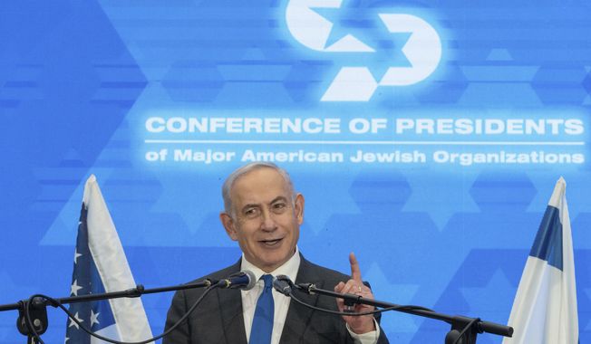 Prime Minister Benjamin Netanyahu speaks during a gathering of Jewish leaders at the Museum of Tolerance in Jerusalem, Sunday, Feb. 18, 2024. (AP Photo/Ohad Zwigenberg)
