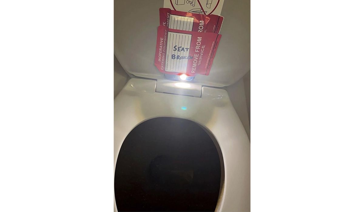 NextImg:Flight attendant accused of trying to video record teen girl in airplane bathroom held until trial