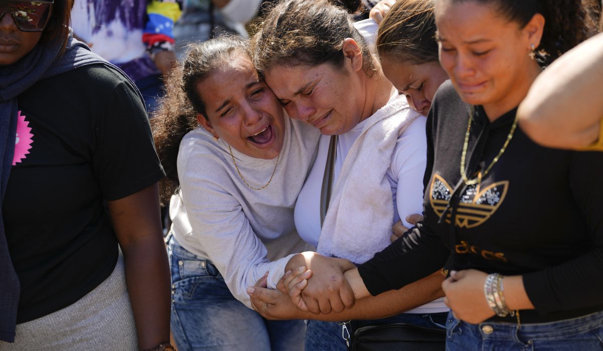 NextImg:Families bid farewell to miners killed in Venezuela’s worst mining accident in years