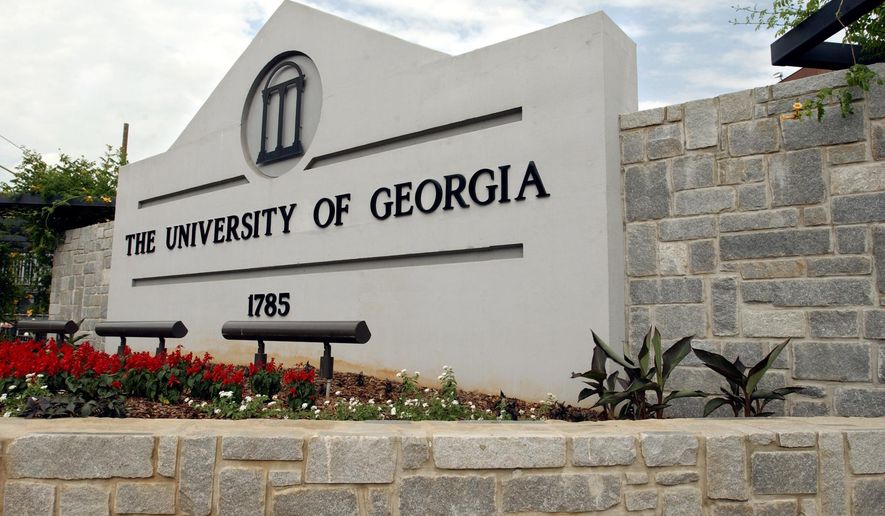 FILE - A sign for the University of Georgia is seen, May 28, 2004, in Athens, Ga. A woman was found dead Thursday, Feb. 22, 2024, on the campus of the University of Georgia after a friend told police she had not returned from a morning run, the university said. (AP Photo/Allen Sullivan, File)