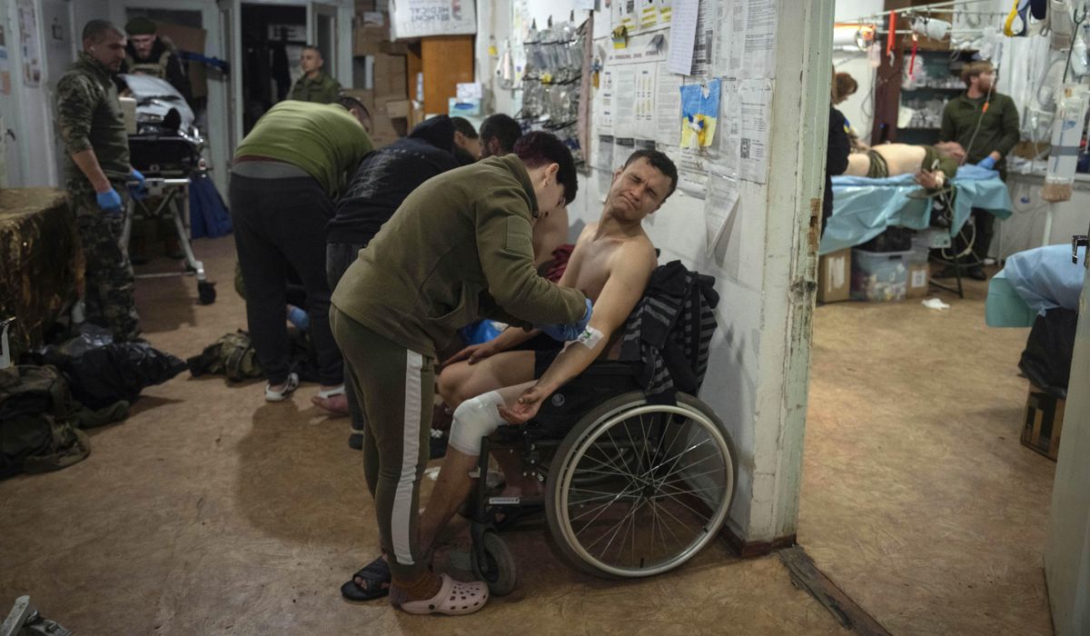 NextImg:For medics on the front line in Ukraine, the biggest shortfall is people
