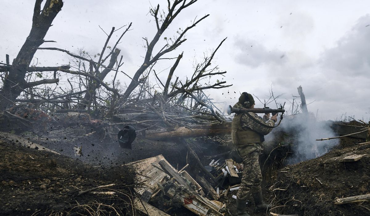 NextImg:Ukrainian troops facing ammunition shortages two years after Russian invasion