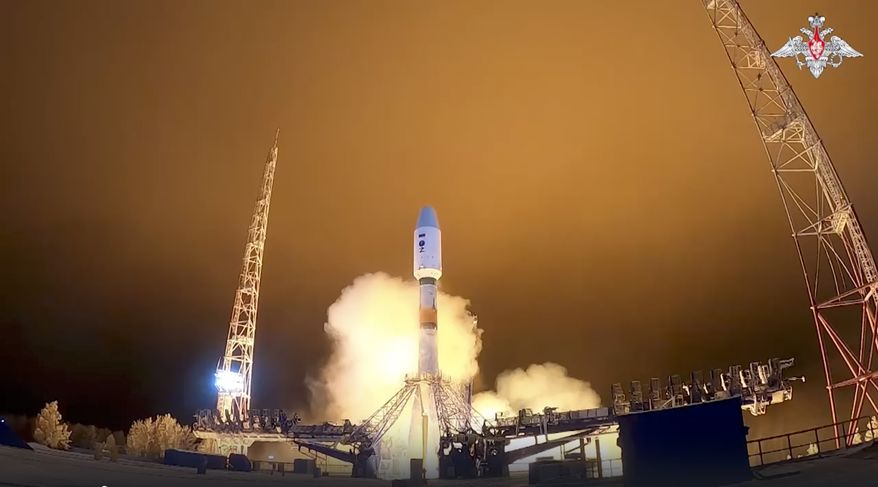 In this handout photo taken from video released by the Russian Defense Ministry Press Service, A Soyuz-2.1b rocket carrying a spacecraft of the Russian Defense Ministry takes off from a launch pad of Plesetsk Cosmodrome outside Plesetsk, northern Russia, Thursday, Dec. 1, 2022. (Russian Defense Ministry Press Service via AP) **FILE**