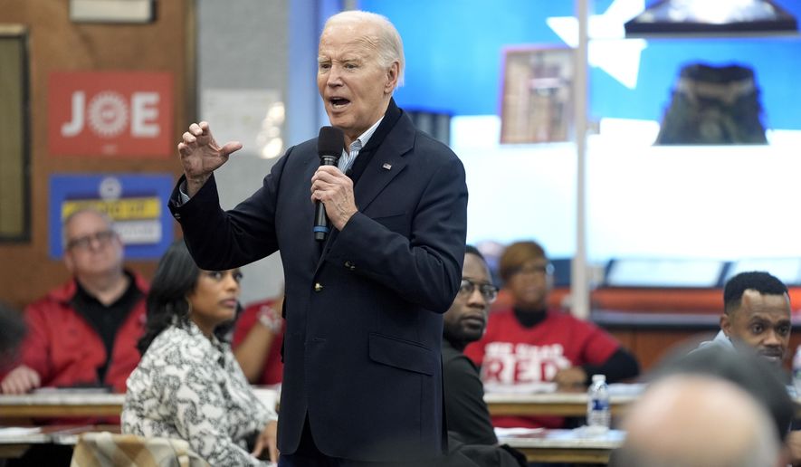 President Joe Biden meets with UAW members during a campaign stop at a phone bank in the UAW Region 1 Union Hall, Feb. 1, 2024, in Warren, Mich. (AP Photo/Evan Vucci) **FILE**