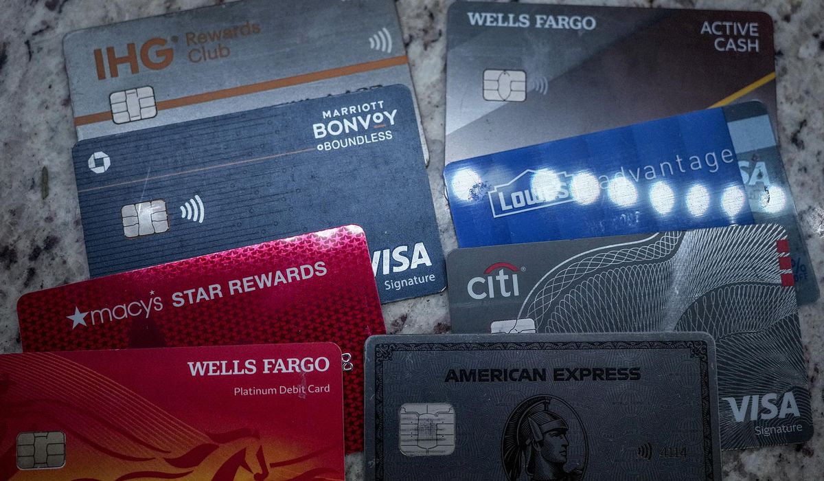 NextImg:Americans’ credit card fees have surged 50% since Biden became president