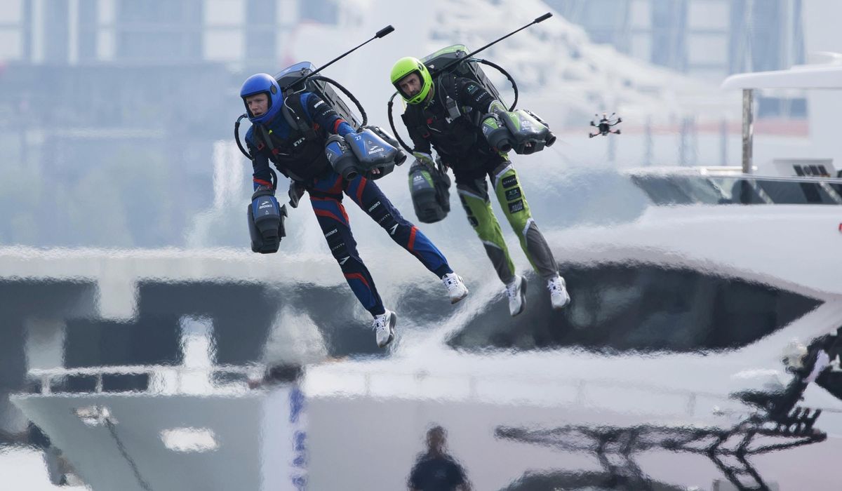 NextImg:Real life ‘Iron Man’: Pilots race in jet suits against a backdrop of Dubai skyscrapers