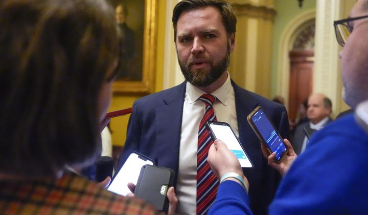 Sen. J. D. Vance, R-Ohio, speaks with members of the media, on Wednesday, Feb. 28, 2024, at the Capitol in Washington. The senator slammed the Biden administration for its handling of the Israel-Hamas war and its failure to secure the release of hostages. (AP Photo/Mark Schiefelbein)