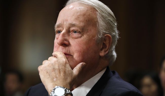 FILE - Brian Mulroney, the former prime minister of Canada, listens during a Senate Foreign Relations Committee hearing on the Canada-U.S.-Mexico relationship, Tuesday, Jan. 30, 2018, on Capitol Hill in Washington. Mulroney has died at the age of 84, his daughter Caroline Mulroney posted on social media, Thursday, Feb. 29, 2024. (AP Photo/Jacquelyn Martin, File)