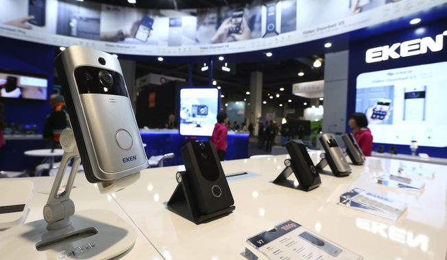 An EKEN doorbell camera, along with other models, are shown on display at CES International, Jan. 10, 2019, in Las Vegas. Some doorbell cameras sold by Amazon and other online retailers have security flaws that could allow bad actors to view footage from the devices or control them completely, according to an investigation published Thursday, Feb. 29, 2024, by Consumer Reports. (AP Photo/Ross D. Franklin, File)