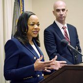 Assistant Attorney General Kristen Clarke of the U.S. Department of Justice Civil Rights Division announces an investigation into the City of Lexington, Miss., and the Lexington Police Department, Wednesday, Nov. 8, 2023, in Jackson, Miss. as U.S. Attorney Todd W. Gee looks on. The Lexington police department unconstitutionally jailed people for unpaid fines without first assessing whether they could afford to pay them, the U.S. Department of Justice said Thursday, Feb. 29, 2024. (AP Photo/Rogelio V. Solis, File)
