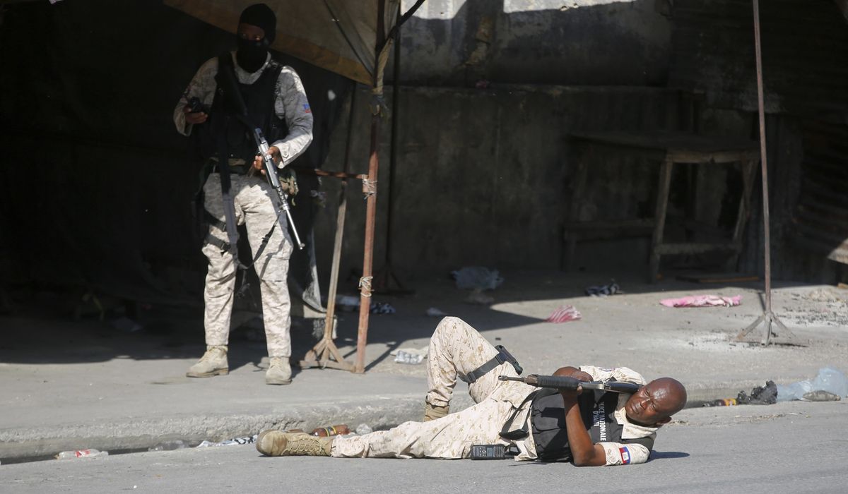 NextImg:Hundreds of inmates flee after armed gangs storm Haiti’s main prison, leaving bodies behind