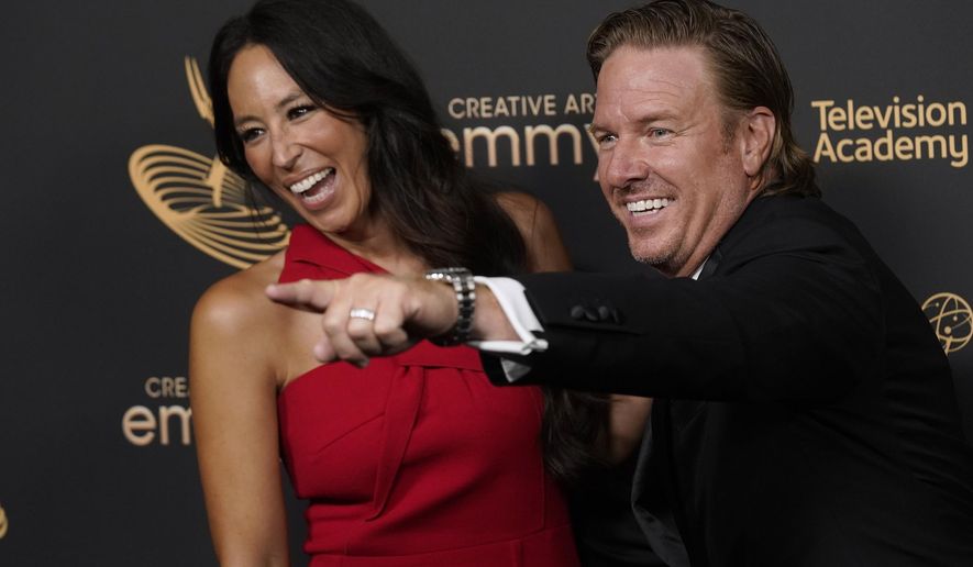 HGTV stars Joanna Gaines, left, and Chip Gaines, pose in the press room on night one of the Creative Arts Emmy Awards in Los Angeles on Sept. 3, 2022. (AP Photo/Chris Pizzello) **FILE**