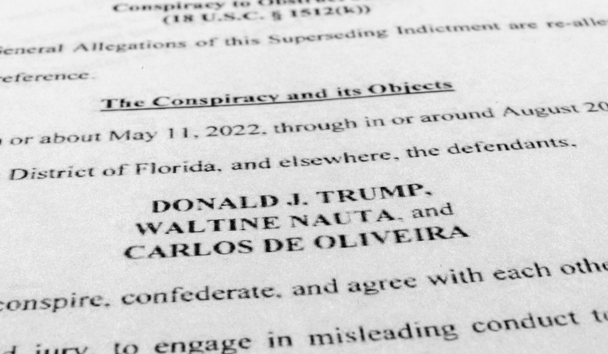 NextImg:Judge in Trump’s classified documents case postpones trial indefinitely