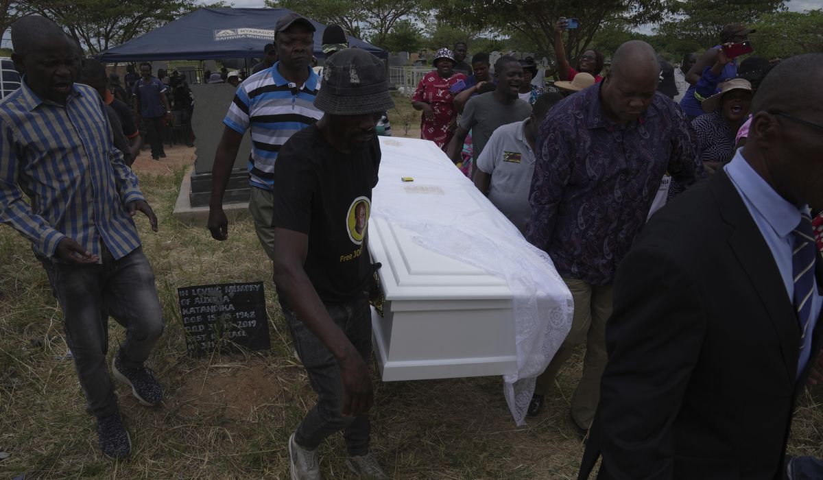 NextImg:At the funeral of a slain Zimbabwean activist, clashes and a low turnout mirror opposition decline