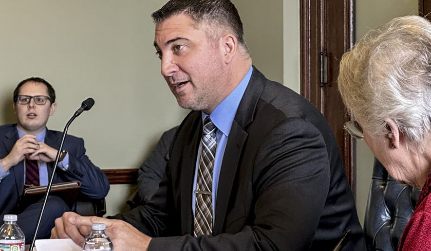 Arkansas State Sen. Clint Penzo speaks at a legislative hearing at the state Capitol in Little Rock, Arkansas on Friday, Dec. 15, 2023. Penzo is challenging U.S. Rep. Steve Womack in the Republican primary for the third congressional district in Arkansas. (AP Photo/Andrew DeMillo)