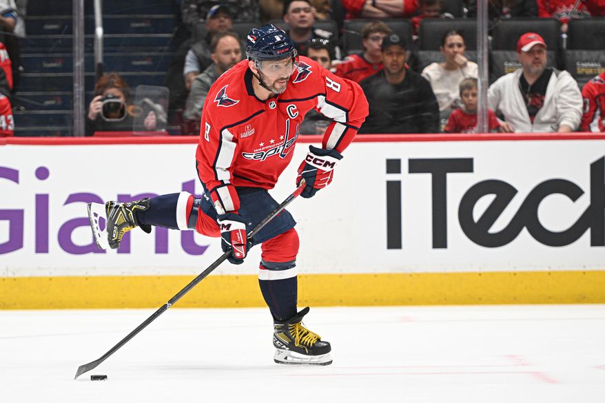 Washington Capitals left wing Alex Ovechkin (8) taking a shot during the third period of an NHL game against the Arizona Coyotes at Capital One Arena in Washington D.C., March 3, 2024. (Photo by Billy Sabatini)