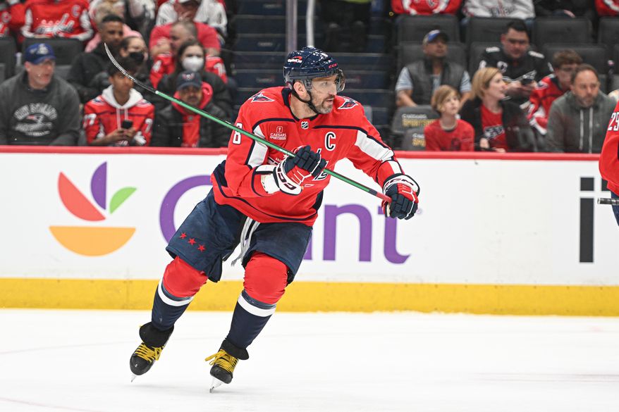 Washington Capitals left wing Alex Ovechkin (8) skating towards the puck during the first period of an NHL game against the Arizona Coyotes at Capital One Arena in Washington D.C., March 3, 2024. (Photo by Billy Sabatini)