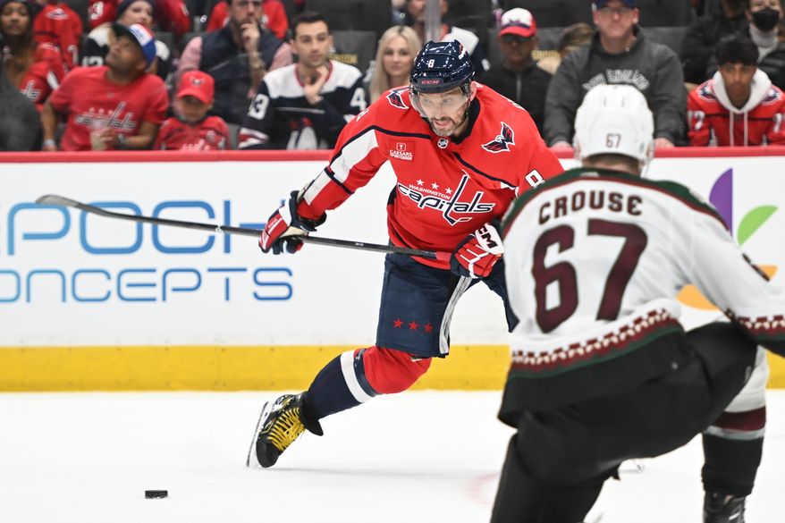 Washington Capitals left wing Alex Ovechkin (8) taking a shot during the third period of an NHL game against the Arizona Coyotes at Capital One Arena in Washington D.C., March 3, 2024. (Photo by Billy Sabatini)