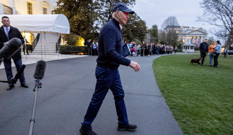 President Joe Biden walks towards Marine One on the South Lawn of the White House in Washington, Friday, March 1, 2024, to travel to Camp David, Md., for the weekend. (AP Photo/Andrew Harnik)