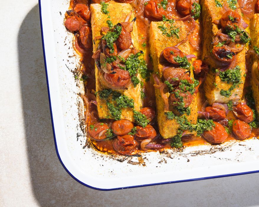This image released by Milk Street shows a recipe for broiled curried salmon. (Milk Street via AP)