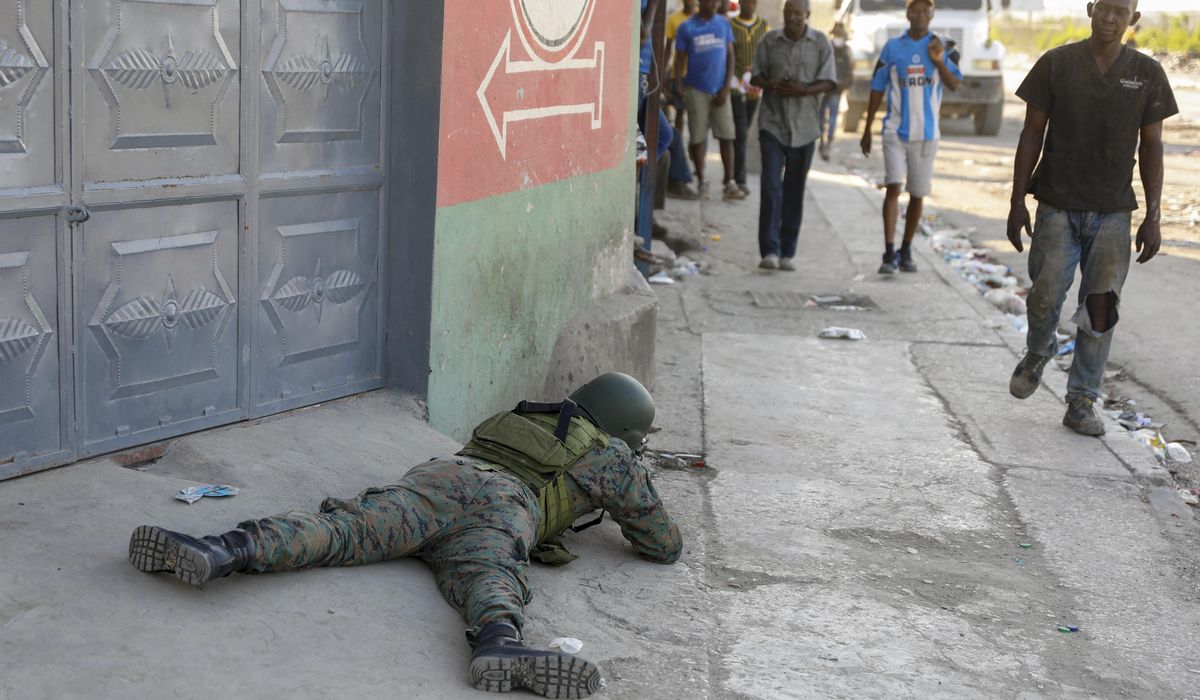 NextImg:Haitian prime minister lands in Puerto Rico as he tries to return home to quell gang violence