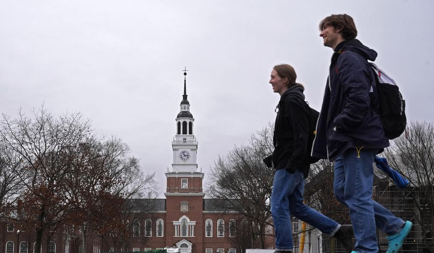 Students cross the campus of Dartmouth College in Hanover, N.H., on Tuesday, March 5, 2024. (AP Photo/Robert F. Bukaty) **FILE**