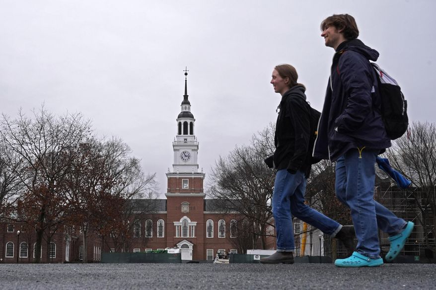 Students cross the campus of Dartmouth College in Hanover, N.H., on Tuesday, March 5, 2024. (AP Photo/Robert F. Bukaty) **FILE**