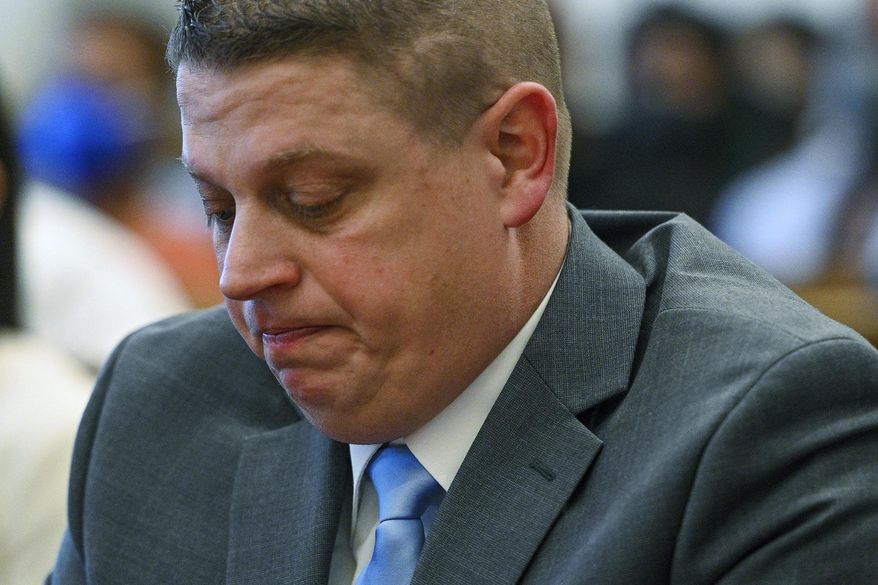 Former Kansas City police detective Eric DeValkenaere listens to witness statements during his sentencing hearing, March 4, 2022 in Kansas City, Mo. The Missouri Supreme Court on Tuesday, March 5, 2024 declined to hear an appeal by DeValkenaere, who is serving a six-year sentence for fatally shooting Cameron Lamb in 2019. (Jill Toyoshiba/The Kansas City Star via AP, file)