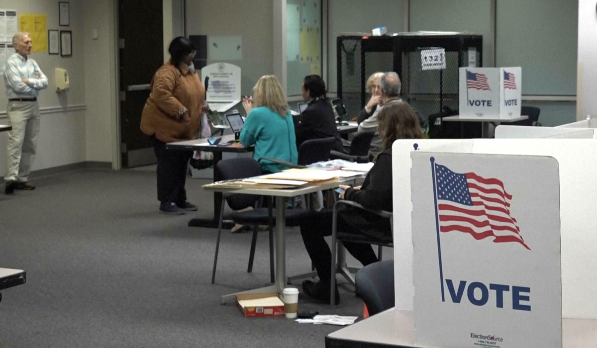 NextImg:Voters in Virginia’s presidential primary cast ballots for Joe Biden, Donald Trump