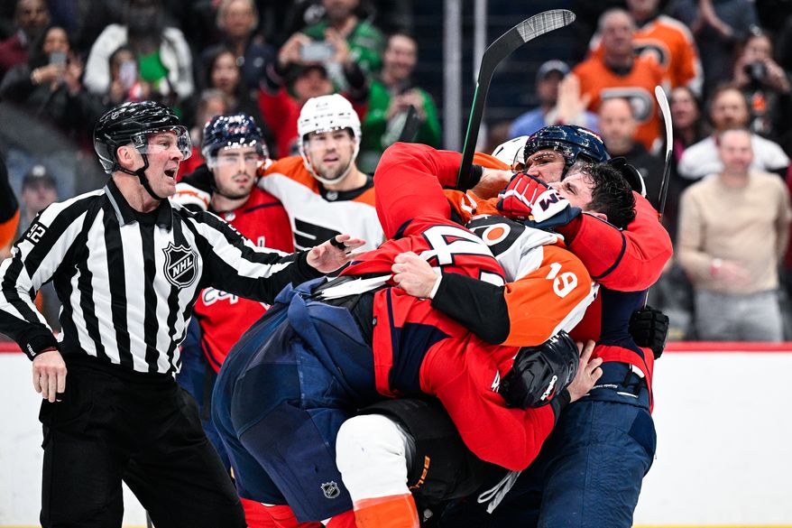 Washington Capitals right wing Tom Wilson (43) and former teammate Philadelphia Flyers right wing Garnet Hathaway (19) get into a physical altercation at Capital One Arena, Washington, D.C., March 1, 2024. (Photo by Brian Murphy for the Washington Times)