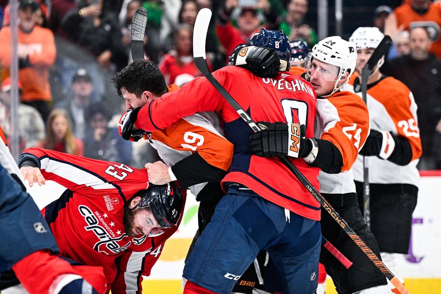 Washington Capitals right wing Tom Wilson (43) and former teammate Philadelphia Flyers right wing Garnet Hathaway (19) get into a physical altercation at Capital One Arena, Washington, D.C., March 1, 2024. (Photo by Brian Murphy for the Washington Times)