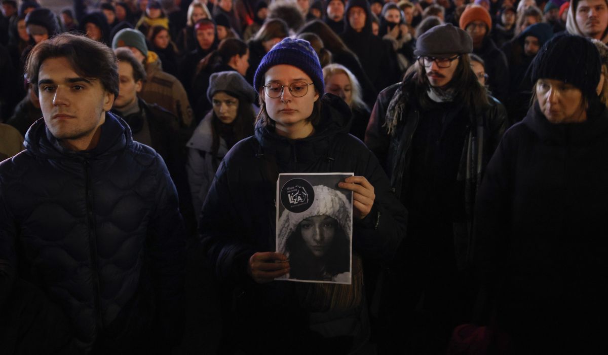 NextImg:Mourners honor woman who was raped and killed in Poland’s capital after fleeing Belarus