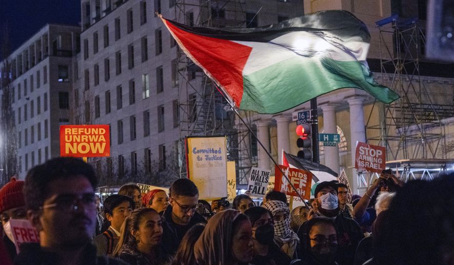Protesters rally near the White House demanding a permanent cease-fire and end to U.S. funding to Israel on Wednesday, March 7, 2024 in Washington. (AP Photo/Kevin Wolf) **FILE**