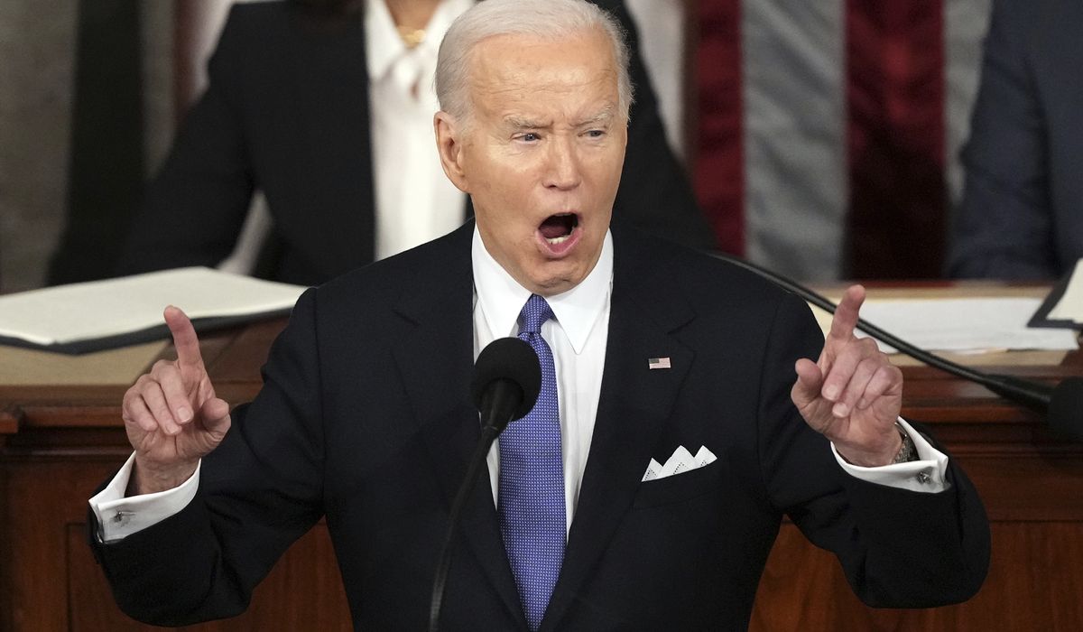 NextImg:Biden delivers feisty State of the Union speech with barbs aimed at Trump, Republicans